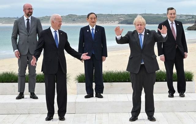 June 11, 2021:  (L-R) President of the European Council Charles Michel, US President Joe Biden, Japanese Prime Minister Yoshihide Suga, British Prime Minister Boris Johnson, and Italian Prime Minister Mario Draghi pose at the G7 Summit in Carbis Bay, Cornwall. 