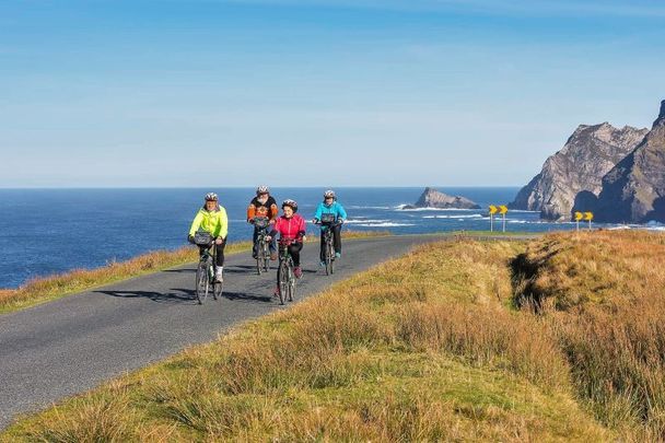 Cycling o Malin Beg, Co Donegal along Ireland\'s Wild Atlantic Way.