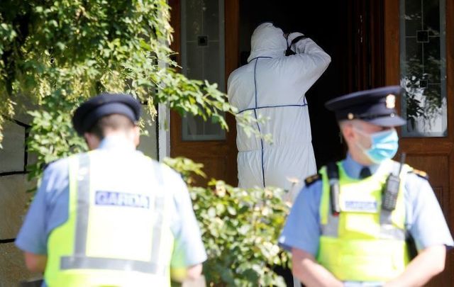 June 21, 2021: Garda wearing face masks as Technical Bureau (Forensic Teams) arrive outside a house in Carriglea View, a housing estate in Firhouse in Dublin where a man was fatally stabbed on June 20.