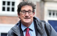 "Isn't a good look" - Backlash as Irish minister cleans glasses with face mask