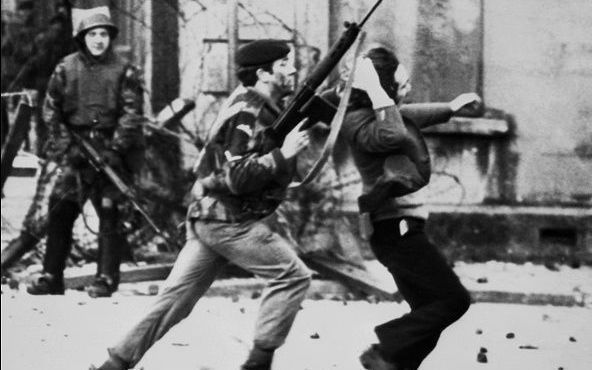 A British soldier shoves a civilian during Bloody Sunday in Derry. 