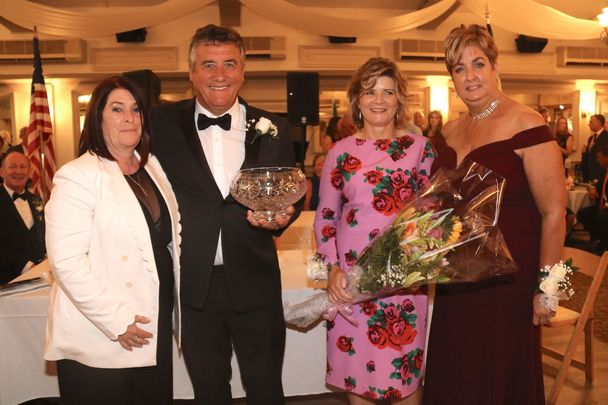 New York GAA Chairperson Joan Henchy (far left) and treasurer Clare McCartney (far right) with two of the honorees at this year’s dinner dance, Seamus and Caitriona Clarke.