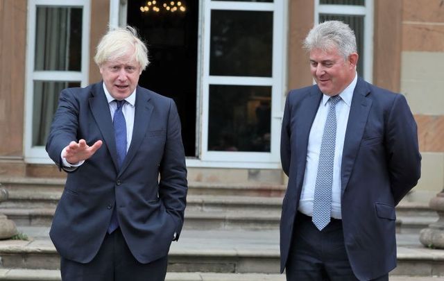 August 13, 2020: Prime Minister Boris Johnson and Northern Ireland Secretary of State Brandon Lewis at Hillsborough Castle during the Prime Minister\'s visit to Belfast.