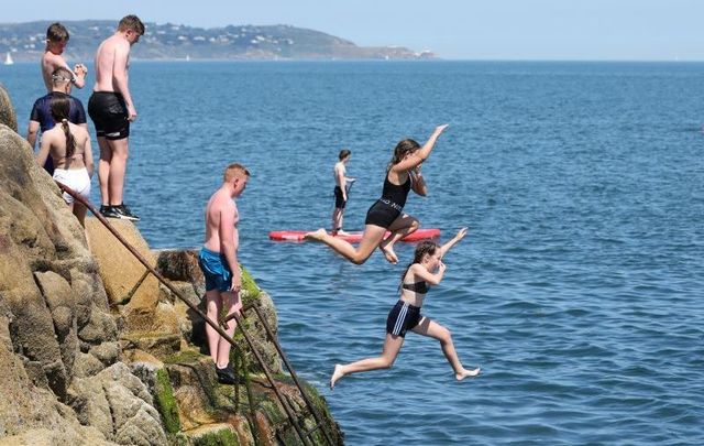 July 21, 2021: People flock to Sandycove Beach in Dublin amid Ireland\'s heatwave.