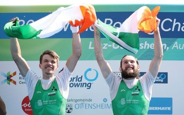 Fintan McCarthy (left) and Paul O\'Donovan (right) celebrate winning the men\'s lightweight double sculls event at the 2019 World Rowing Championships in Austria. 
