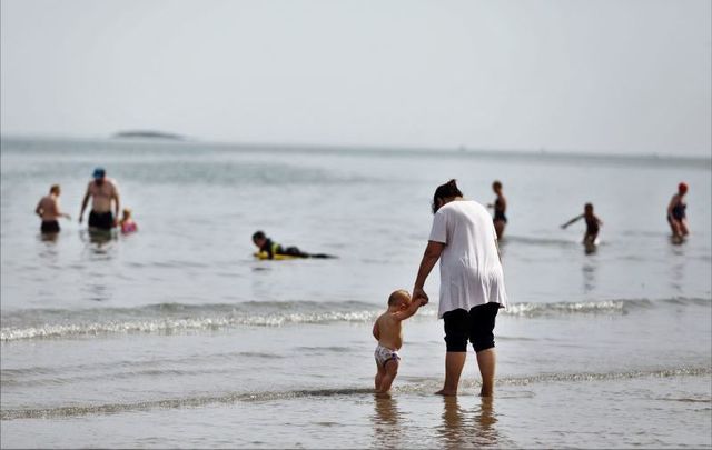 July 22, 2021: Burrow Beach in Sutton, Dublin, where members of the public gathered to enjoy the sun and go swimming.