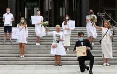 Irish brides stage protest in Dublin over number of guests permitted at weddings