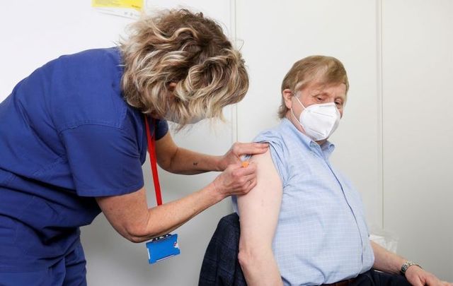 April 4, 2021: Jerry Leahy is given their first dose of the Covid-19 vaccine by nurse Margaret Dobbin at the HSE Vaccination Centre in the Aviva Stadium. 