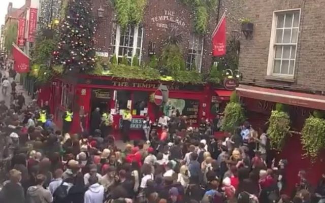 Protestors gather outside the Temple Bar pub in Dublin on Thursday. 