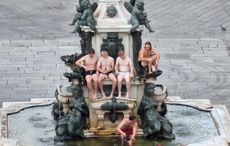 Nearly naked Irish tourists fined for mounting centuries-old fountain in Italy