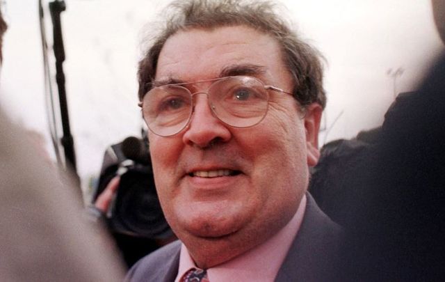 April 10, 1998: John Hume, then the leader of the SDLP, is delighted as he talks to media at Stormont Castle as the peace deal falls into place.
