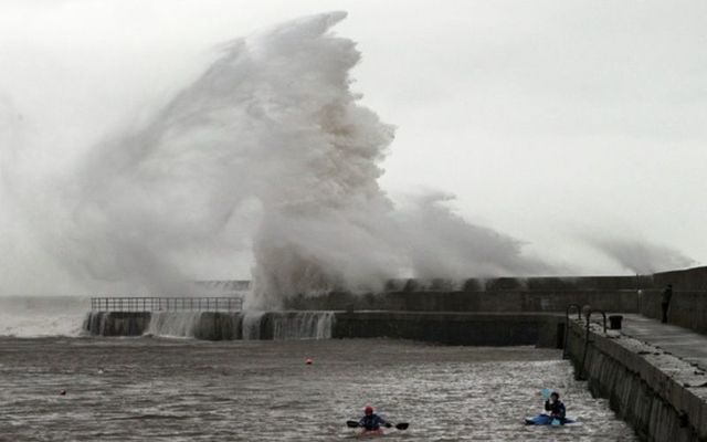 Ireland\'s weather has become \"warmer and wetter\" over the past century, according to a new climate report. 