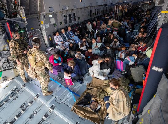 German military loads planes to civilians escaping Afghanistan as the Taliban takes control once more.