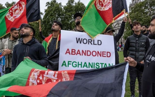 Afghan protestors gather in London after the Taliban stormed Kabul on Sunday. 