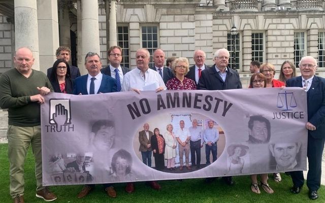 Victims of The Troubles with political parties outside Belfast City Hall \n