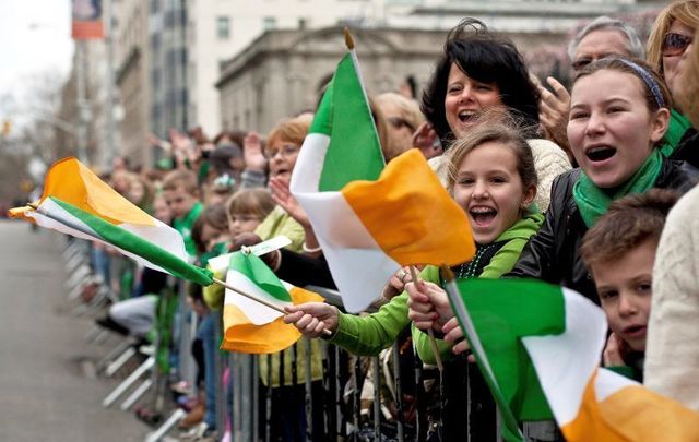 March 17, 2012: Revelers cheer on the marchers during the 251st annual St. Patrick\'s Day Parade in New York City.