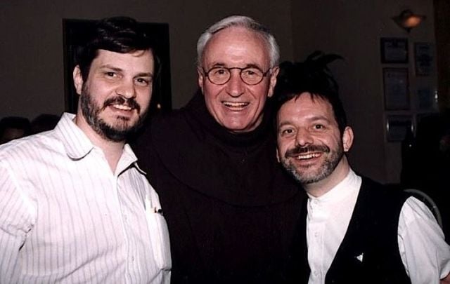 Dr. Tom Moulton and his spouse Brendan Fay flank Father Mychal Judge in a favorite photo.