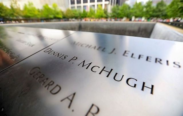 Dennis P. McHugh\'s name on Panel 5-18 at the South Memorial Pool at the 9/11 Memorial in New York City.
