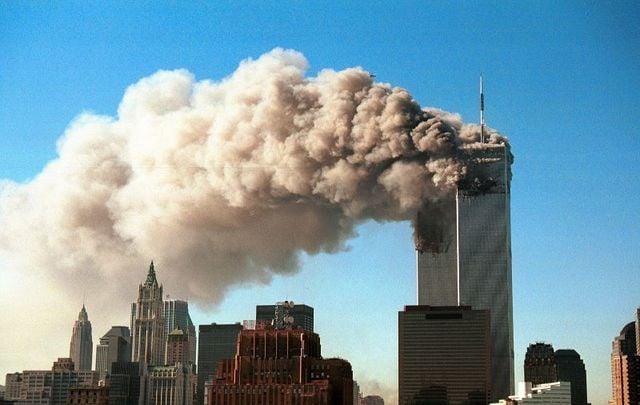 The Twin Towers burn moments before collapsing on 9/11. 