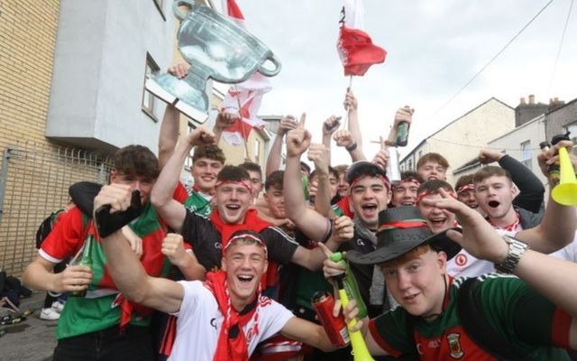 Tyrone and Mayo fans pose for photographs ahead of Saturday\'s All Ireland final. 
