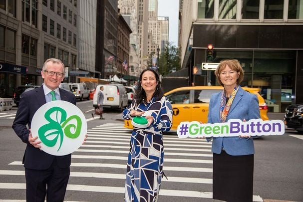 \"Push the Green Button\": Niall Gibbons and Alison Metcalf of Tourism Ireland with  Minister Martin (center) in New York.