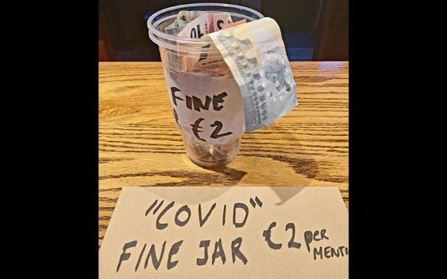 The collections in the  \"COVID fine jar\" at The Alt Bar in Killea, Co Donegal will be donated to charity.