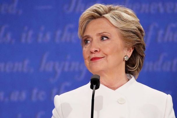 October 19, 2016: Democratic presidential nominee former Secretary of State Hillary Clinton listens to Republican presidential nominee Donald Trump speak during the third U.S. presidential debate at the Thomas & Mack Center in Las Vegas, Nevada.