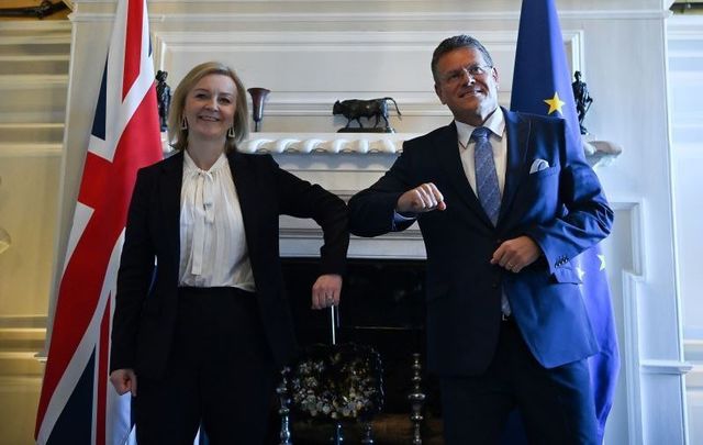 January 13, 2022:: British Foreign Secretary Liz Truss touches elbows with European Commission vice president Maroš Šefčovič during a meeting at Chevening House in London, United Kingdom. Truss hosted her first face-to-face meeting with Sefcovic, aiming to break months of deadlock over post-Brexit trade in Northern Ireland. 