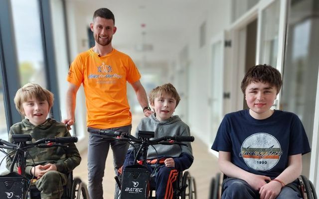 Ben Banaghan with George, Isaac, and Archie Naughton. 