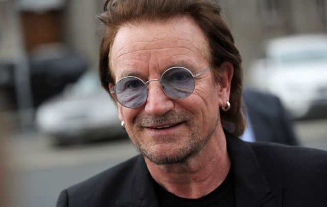 August 28, 2018: U2 singer Bono greets fans outside the Chancellery after he met with German Chancellor Angela Merkel in Berlin, Germany. Bono met with Merkel to discuss issues related to her upcoming trip to Senegal, Ghana, and Nigeria.