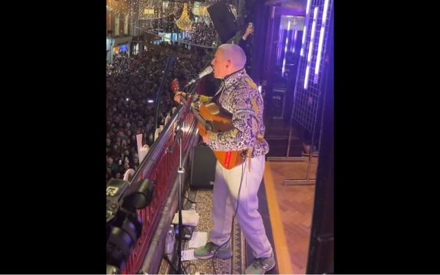 November 22, 2022: Dermot Kennedy busking for charity on the balcony of Bewley\'s Cafe on Dublin\'s Grafton Street.