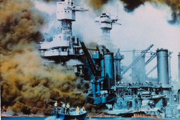 December 7, 1941: American warships on fire in Pearl Harbor, Oahu Island, after a surprise attack by Japanese forces, which brought the USA into WWII.