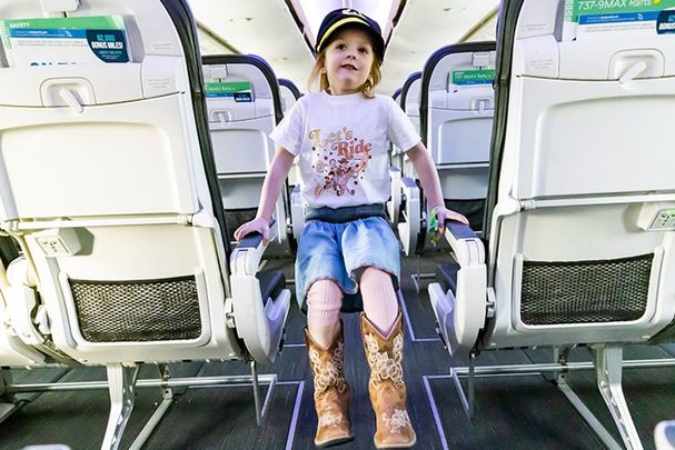 Maeve McNelis aboard her Alaska Air flight to Disney World.