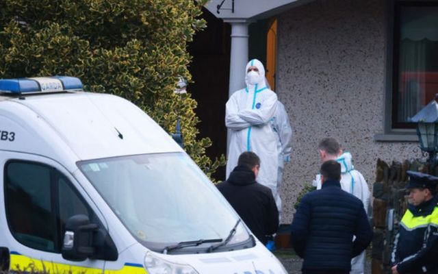 Gardai and forensics outside the house where a body was discovered outside Castleblayney, Co. Monaghan.