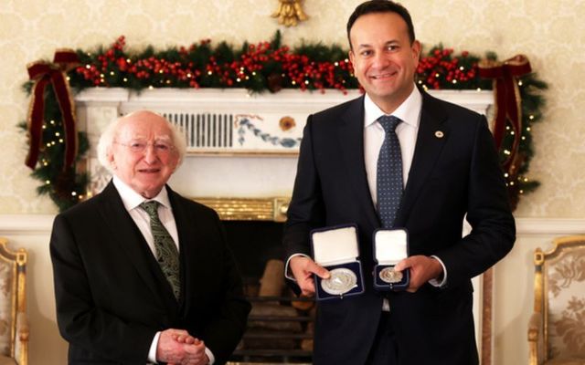 President Michael D. Higgins presents Leo Varadkar with the seals of office in Áras an Uachtaráin on Saturday. 
