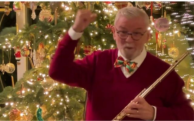Sir James Galway told Lizzo he is her \"number one fan\" in a special Christmas message.
