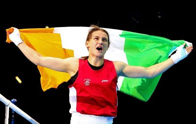 August 9, 2012: Ireland\'s Katie Taylor celebrates winning her bout against Sofya Ochigava of Russia during the Women\'s Light (60kg) Boxing final bout on Day 13 of the London 2012 Olympic Games at ExCeL in London, England.
