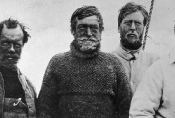 1909: Irish explorer Sir Ernest Henry Shackleton (center), in the southern party on board the vessel \'Nimrod\', on their return voyage from the British Antarctic Expedition.