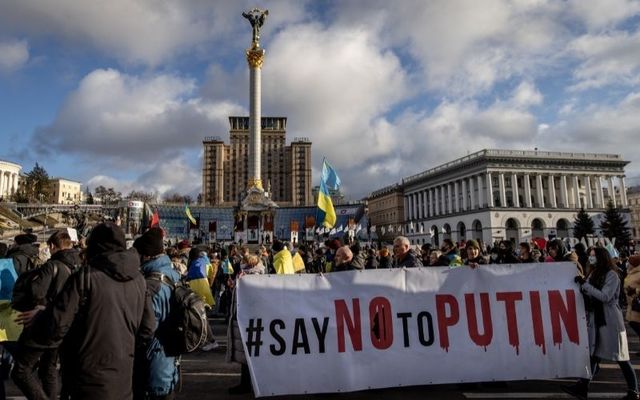 People participate in a Unity March to show solidarity and patriotic spirit over the escalating tensions with Russia on February 12, 2022 in Kyiv, 