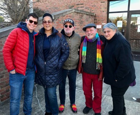 Supporters of LGBT inclusion, including Brendan Fay (second from right), at Holy Family Church on Sunday.