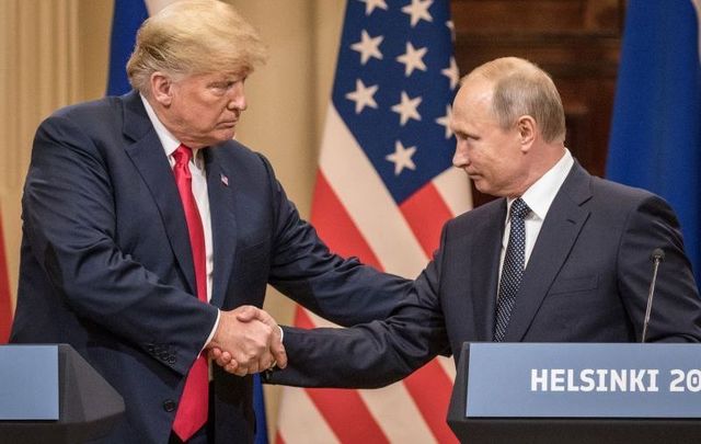 July 16, 2018: US President Donald Trump  and Russian President Vladimir Putin shake hands during a joint press conference after their summit in Helsinki, Finland. The two leaders met one-on-one and discussed a range of issues including the 2016 US Election collusion. 