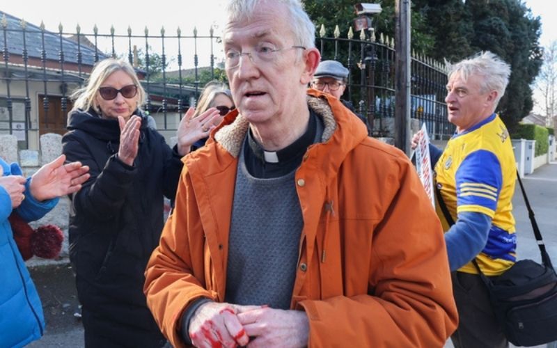 Irish priest throws paint at Russian Embassy during live radio interview