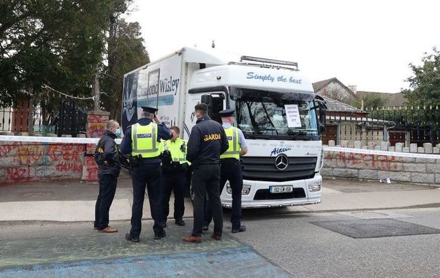 March 7, 2022: Gardai at the scene where a truck was reversed through the gates of the Russian Embassy in Dublin. Driver Desmond Wisley, from Co Leitrim, has been charged and released on bail for the incident.