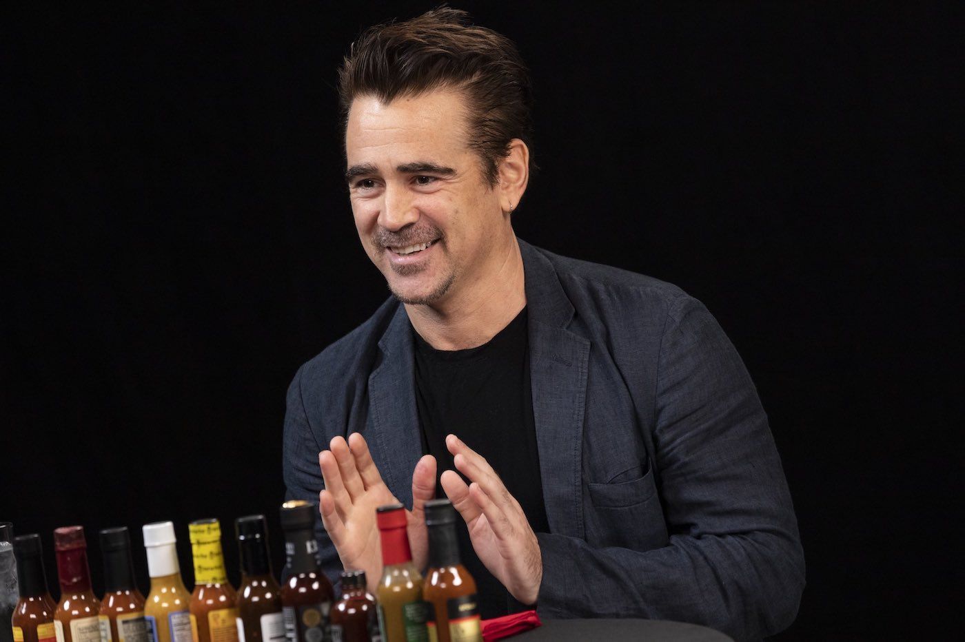 WATCH: Single Colin Farrell digs in to "Hot Ones" with Sean Evans