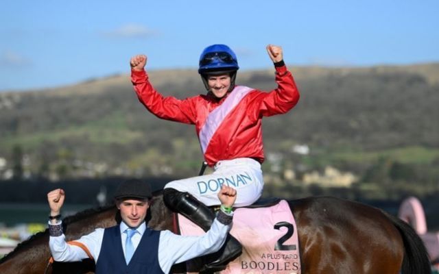 Irish jockey Rachael Blackmore celebrates after she rode A Plus Tard to victory in the Cheltenham Gold Cup, making her the first woman to ever win the prestigious race.