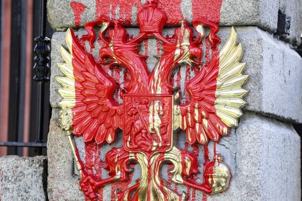 February 24, 2022: Red paint thrown across the coat of arms of the Russian Federation on the gate outside the Russian Embassy on Dublin\'s Orwell Road.