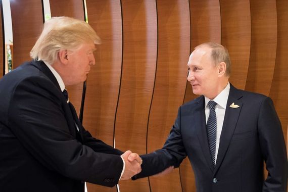 Former president Donald Trump shaking the hand of Russian President Vladimir Putin.