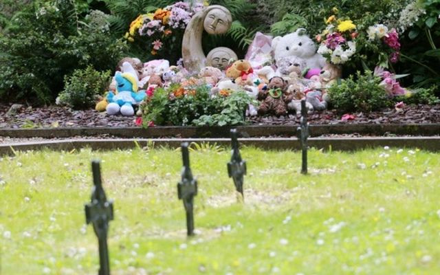 Children\'s teddy\'s and toys along with flowers sit at the \'Little Angels\' memorial plot in the grounds of Bessborough House in Blackrock, Cork.