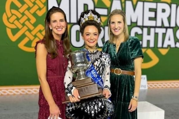 Fauna Gille (left) with sister Cassia (far right) and their student Megan Stuart, who has won the Mid-America Region Oireachtas seven times, the All-Ireland Championships, and placed 2nd at the 2022 World Irish Dancing Championships.
