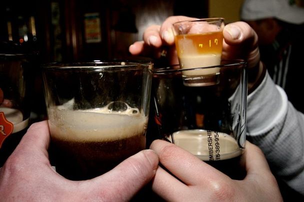 An Irish Car Bomb cocktail involves dropping a shot of Irish whiskey and Baileys into a pint of Guinness.